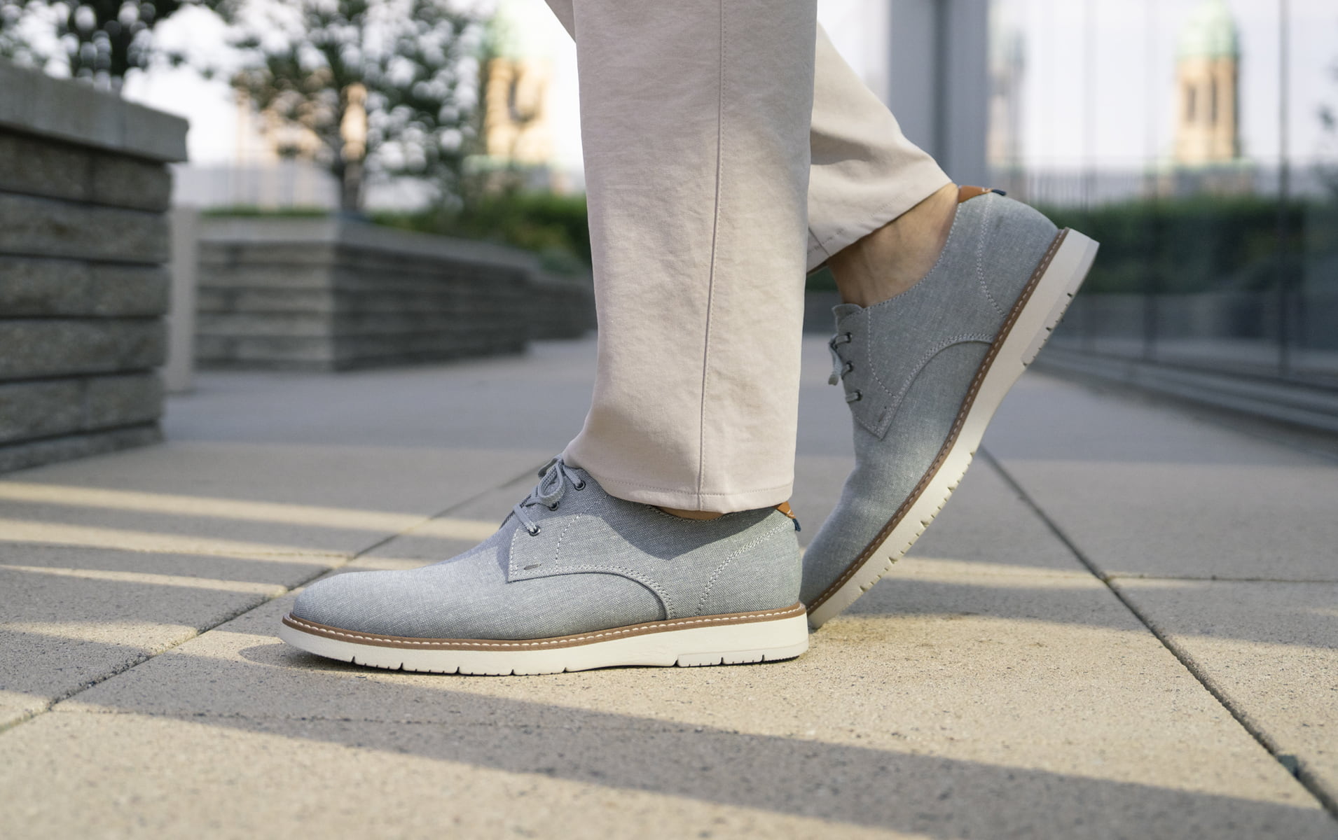 Click to shop Florsheim casuals. Image features the Vibe canvas in grey.