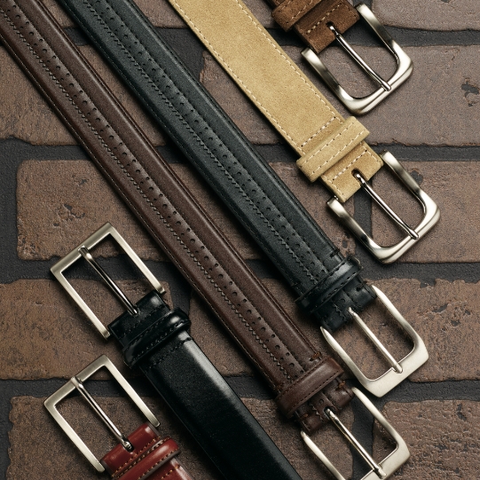 "Men’s Accessories That Complete Your Look." The featured products are a variety of Florsheim belts.