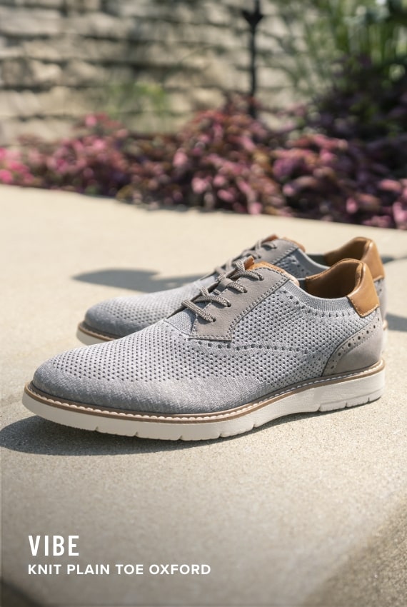 Shoes for Men view all category. Image features the Vibe knit in grey.