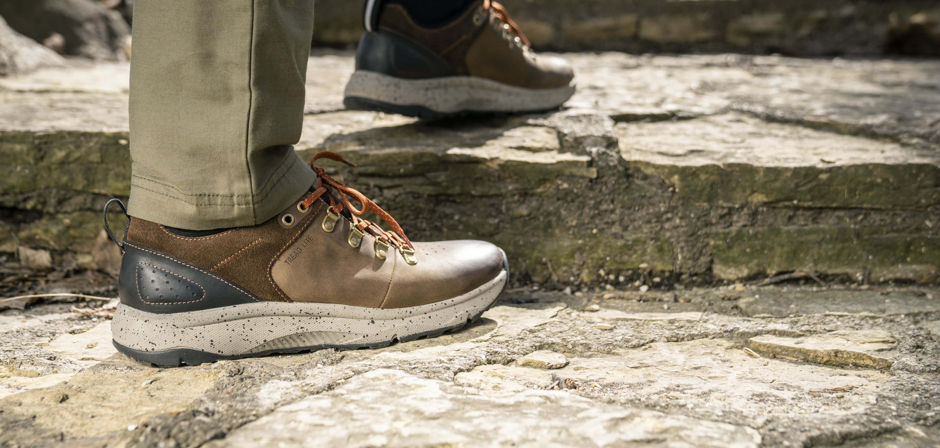 Click to shop Florsheim New Arrivals. Image features the Tread Lite Lace Up sneaker in brown. 
