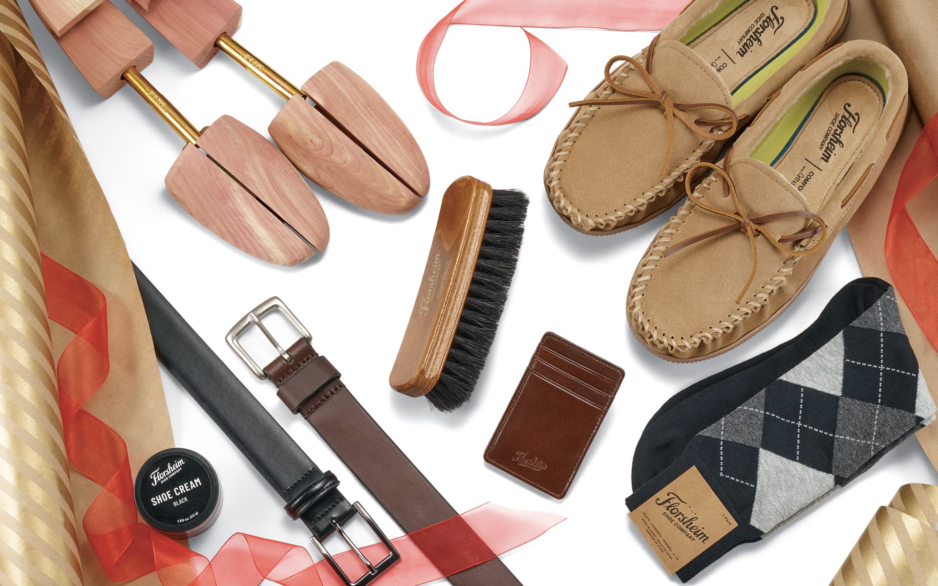 Click to shop our holiday gift guide! Image features a variety of Florsheim products.