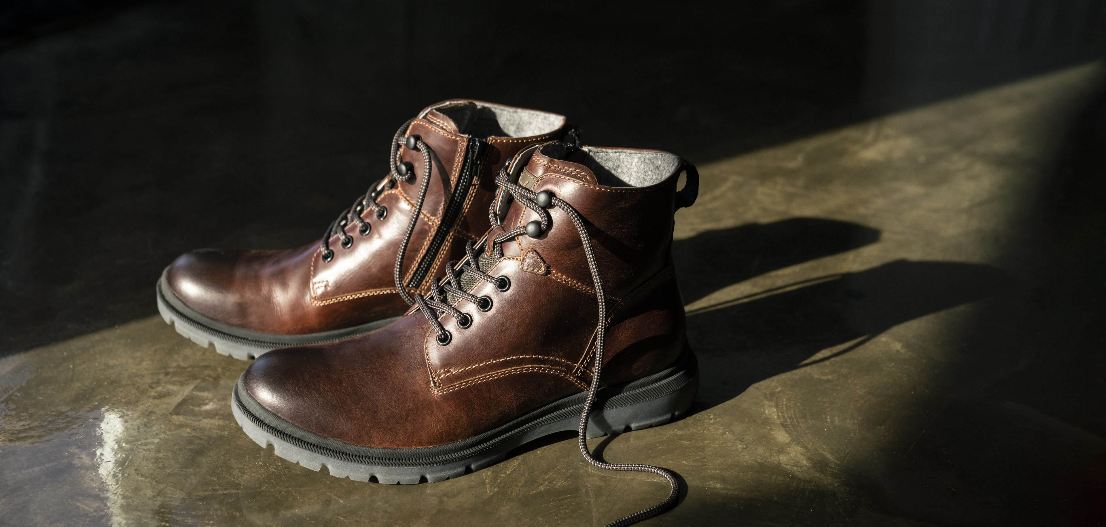 Click to shop Florsheim new arrivals. Image features the Lookout boot in brown.