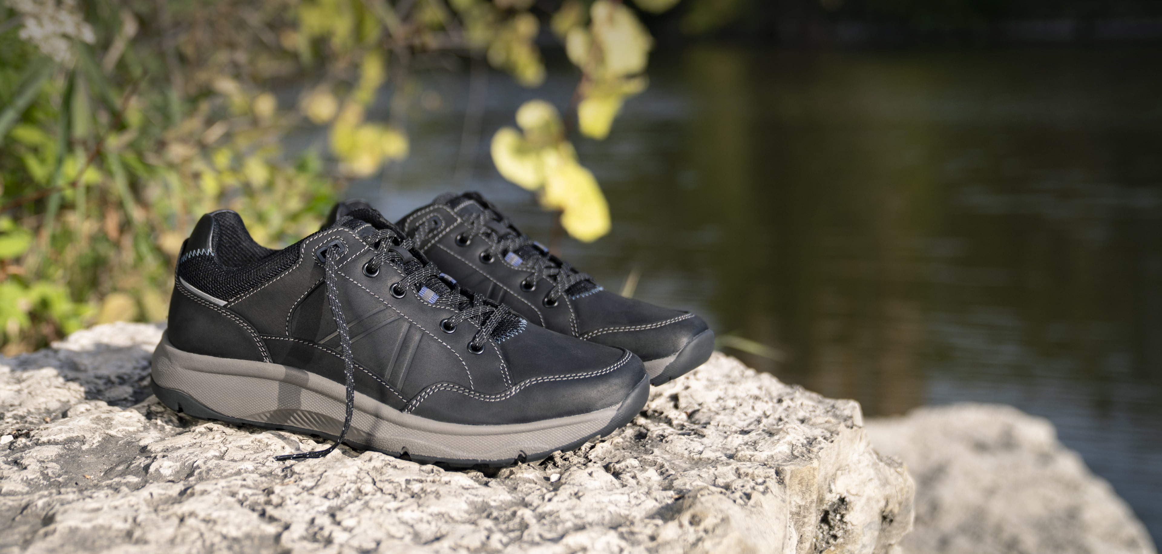 Click to shop Florsheim new arrivals. Image features the Tread Lite sneaker in black.