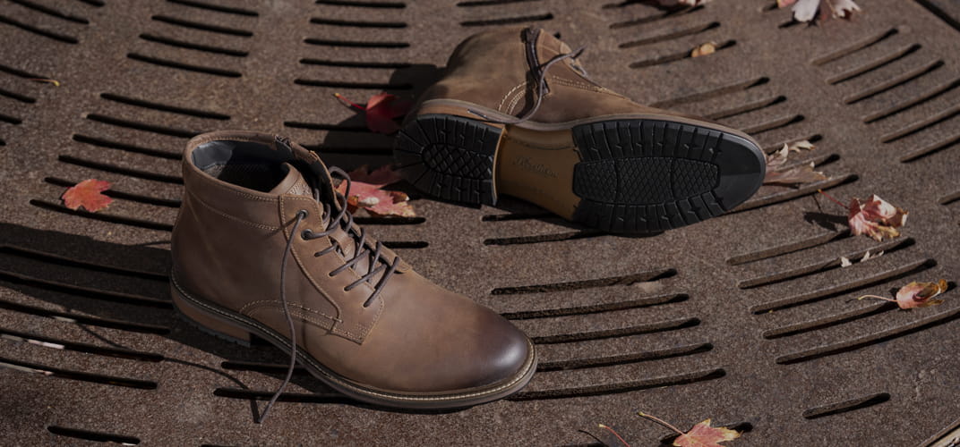 The image features three belt styles lying flat on a black leather surface. Shop the Men’s Accessories category now. 