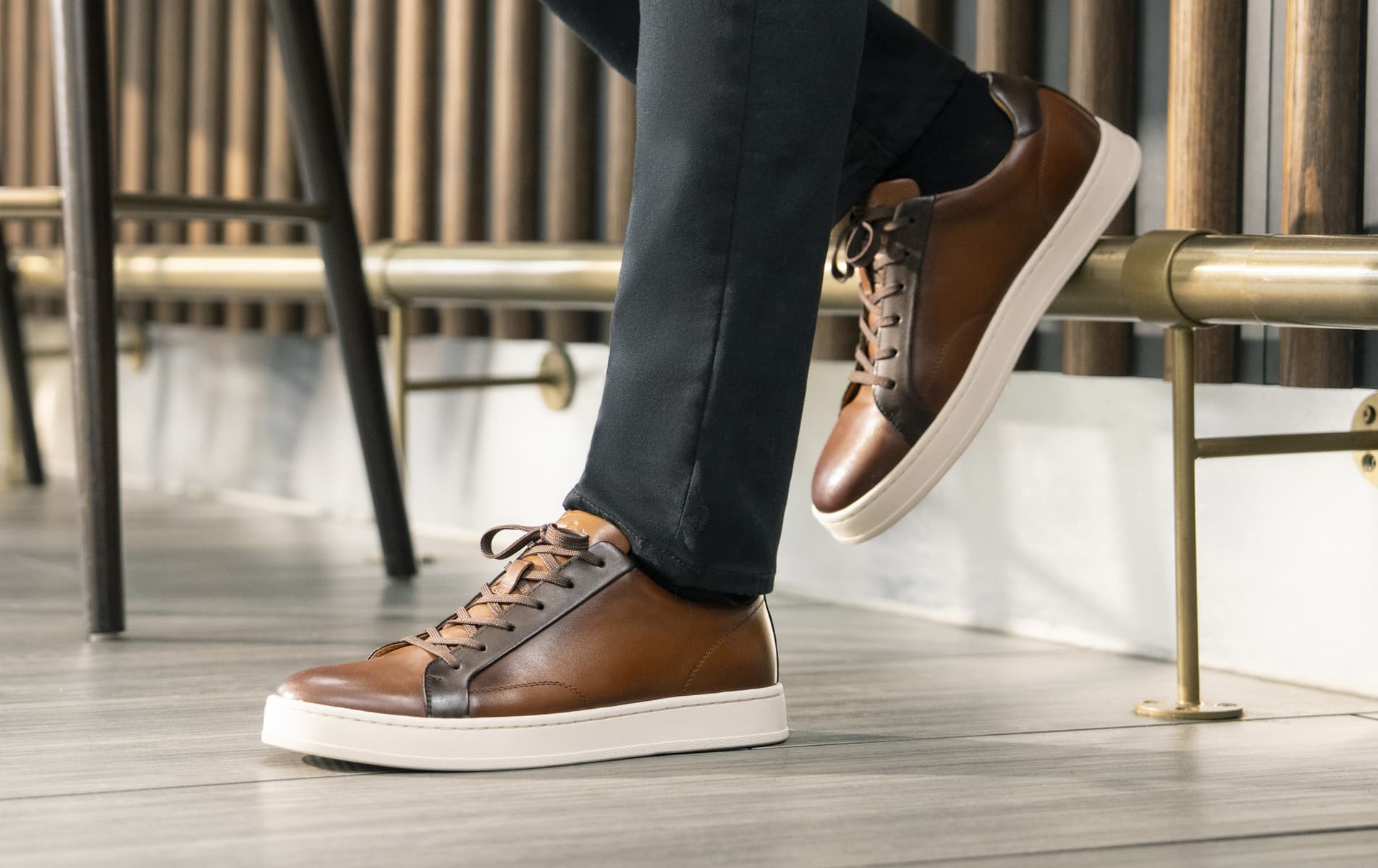 Shop the Florsheim Casual category featuring the Monopoli in Cognac on a wood floor.