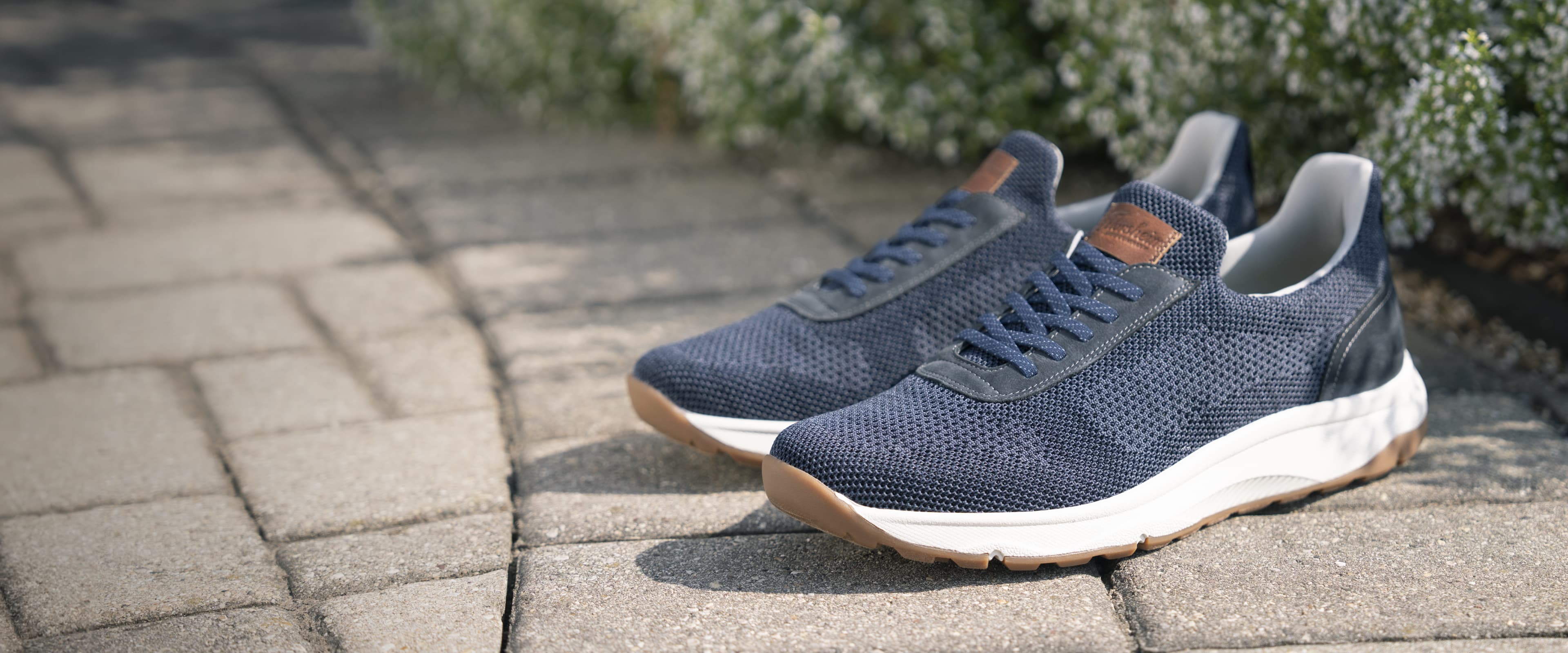 Click to shop Florsheim New Arrivals. Image features the Satellite Knit in navy.