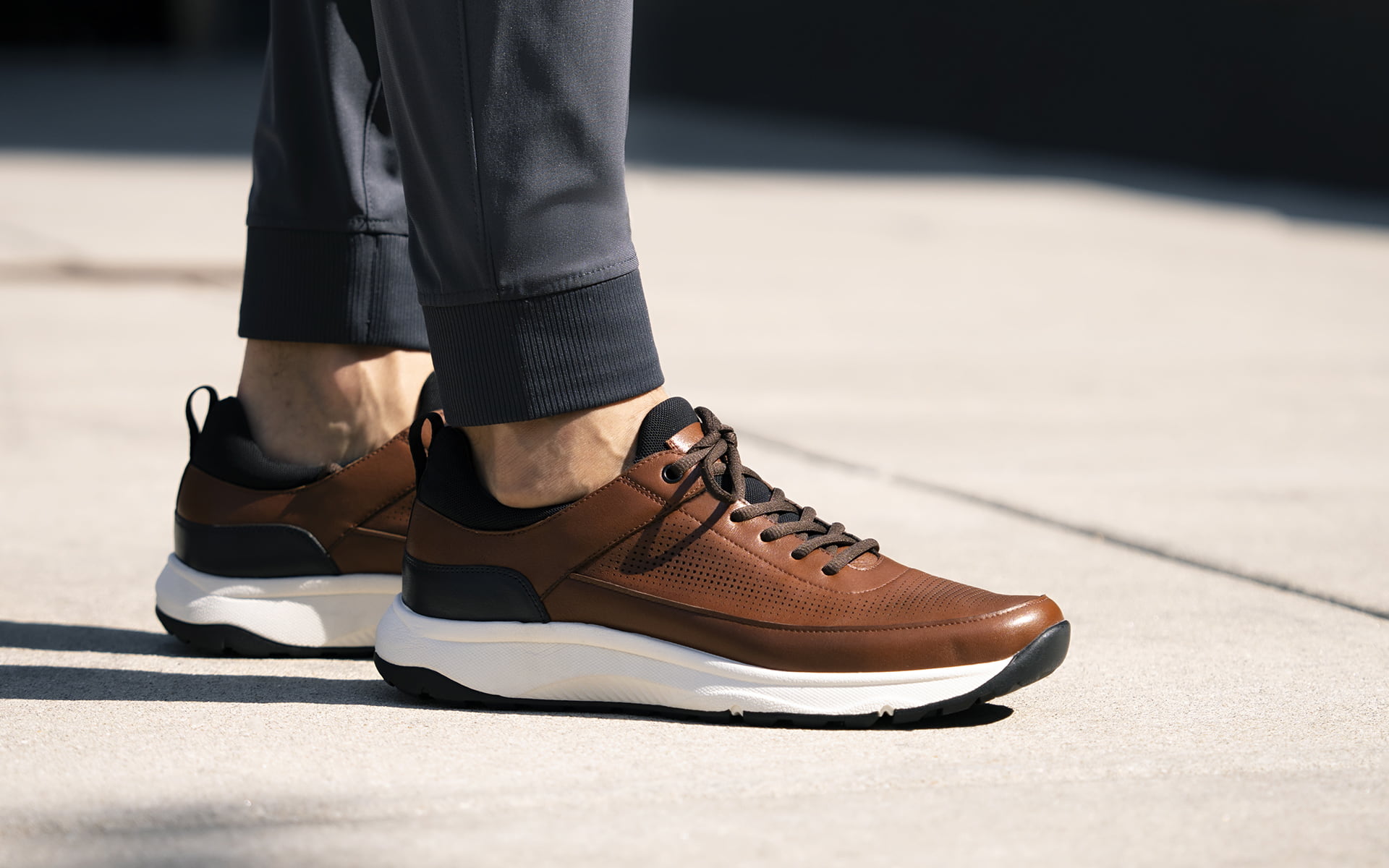Click to shop the Florsheim Satellite collection. Image features the Satellite perf in cognac. 