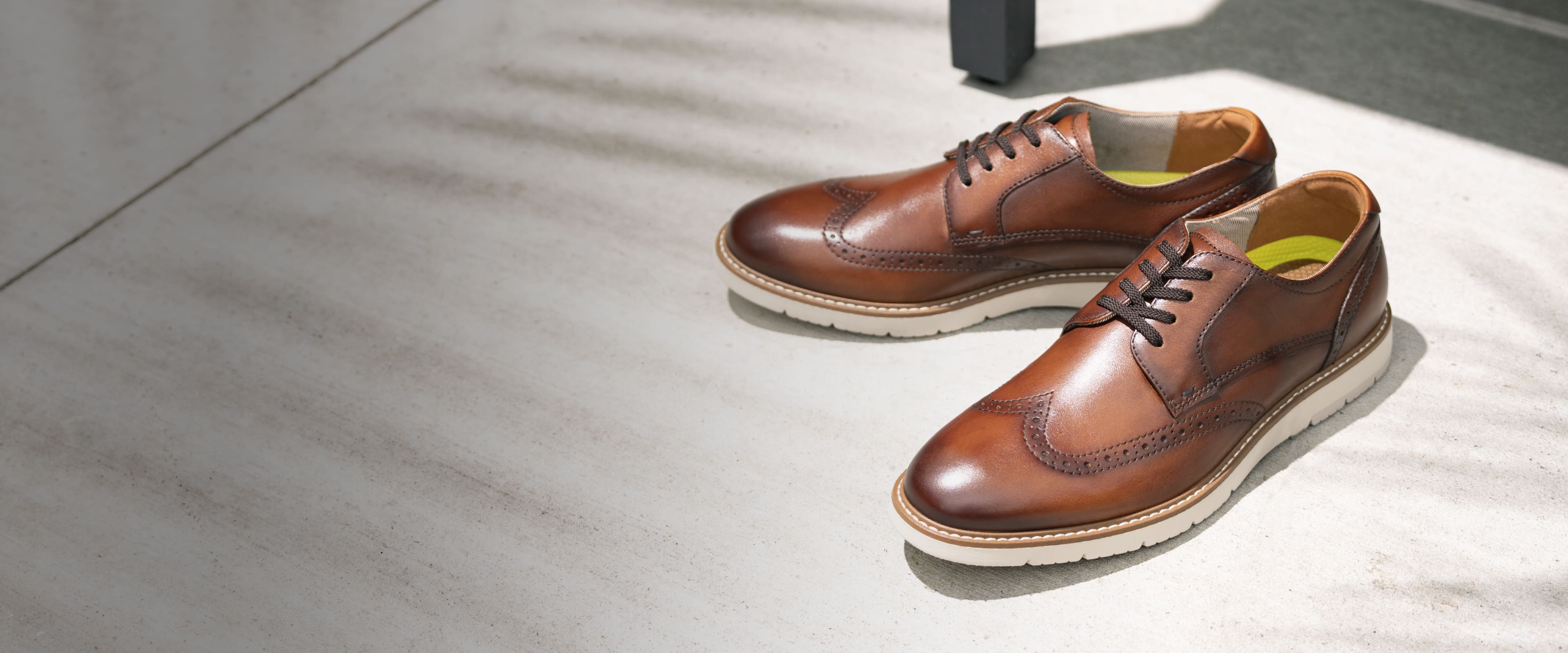 Click to shop Florsheim new arrivals. Image features the Vibe wingtip in cognac.