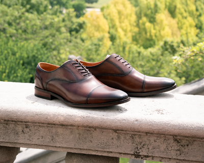 Image features the Sorrento Lux Cap Toe Balmoral Oxfords in Cognac.