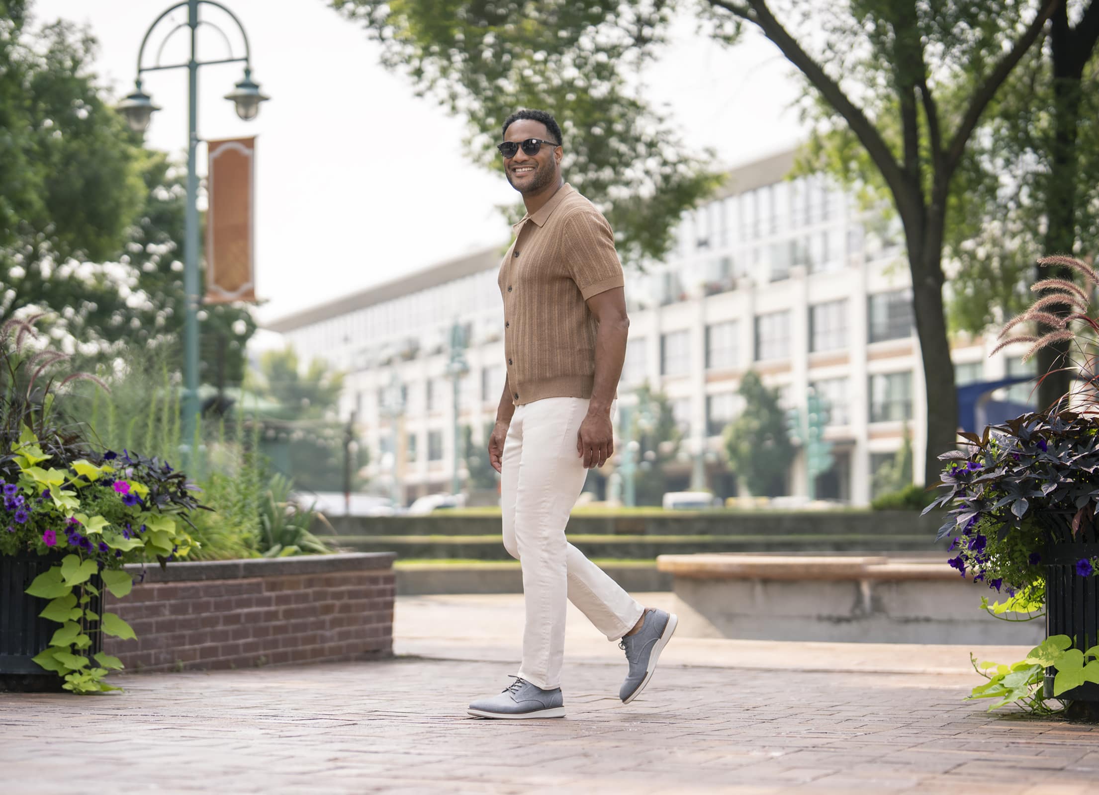 Shop Florsheim new arrivals featuring the a man walking through a park.