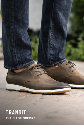 Lodge Collection category. The image features the Transit Plain Toe Oxford in Brown Crazy Horse leather.