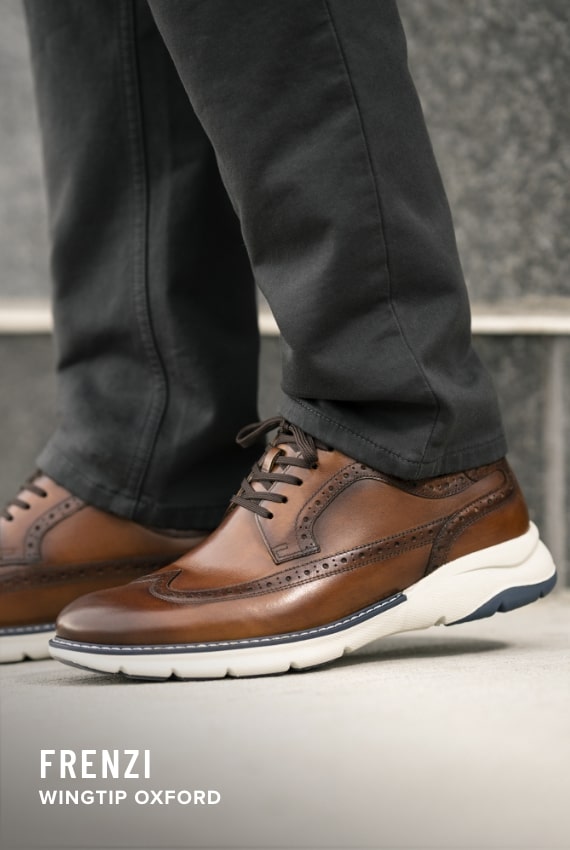 Men's Dress Shoes category. Image features the Frenzi wingtip oxford in cognac multi.