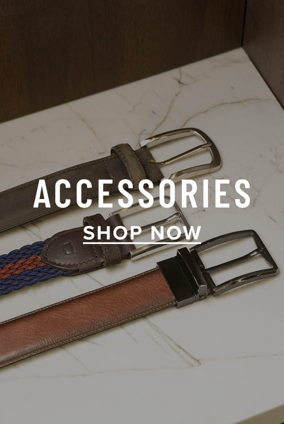 Men's Belts category. Image features a variety of belts on a white marble slab.