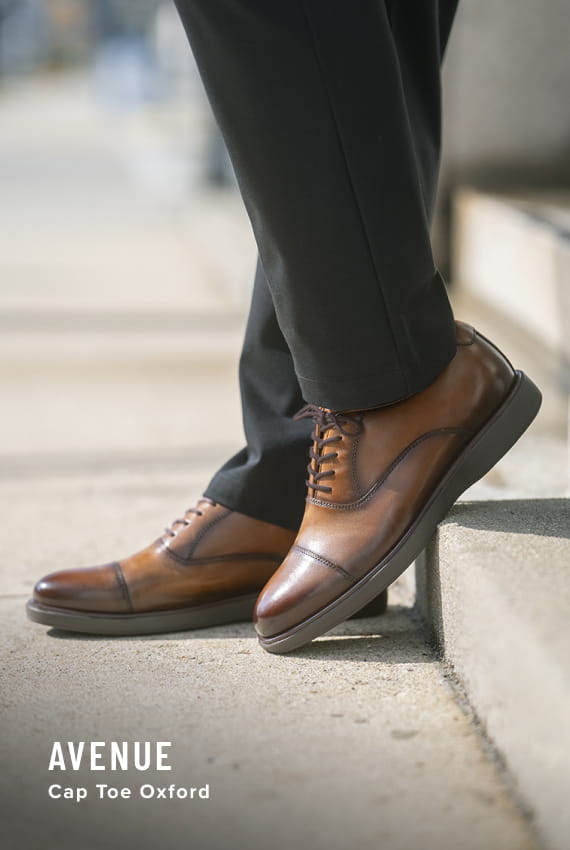 Men's Dress Shoes category. Image features the Avenue Cap Toe Oxford in Cognac.