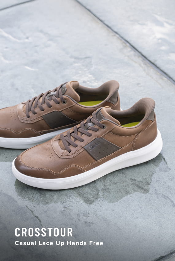 Men's Newest Shoes category. Image features the Crosstour Casual Lace Up Hands Free in Cognac on outdoor tiles.