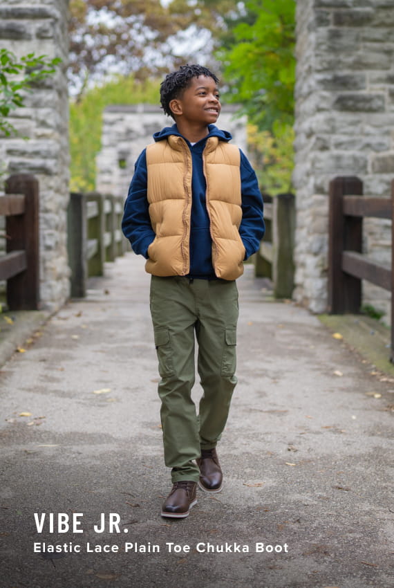 Kids Shoes view all category. Images features the Vibe Jr. Elastic Lace Plain Toe Chukka Boot.
