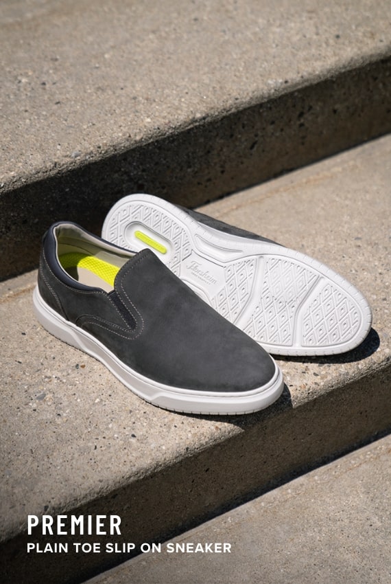 Florsheim Comfortech category. Image features the Premier slip on in grey.
