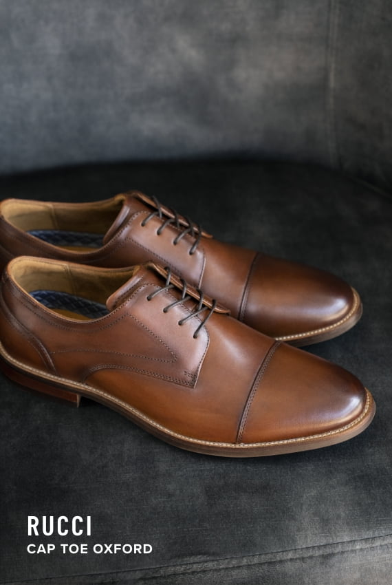 Men's Dress Shoes category. Image features the Rucci cap toe oxford in cognac
