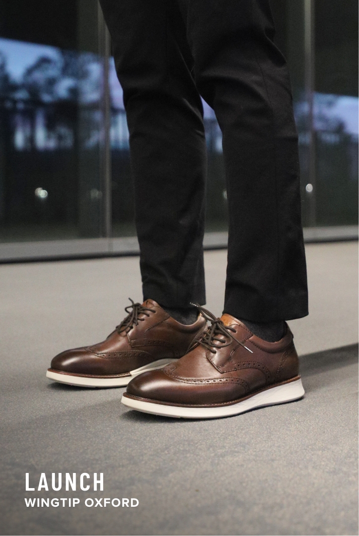 Men's Wingtips category. Image features the Launch wingtip oxford in cognac.