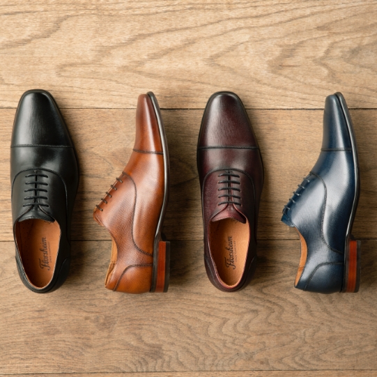 "These Are The Six Shoes Men Need." The featured product is the Postino Cap Toe Balmoral Oxford in a variety of colors.