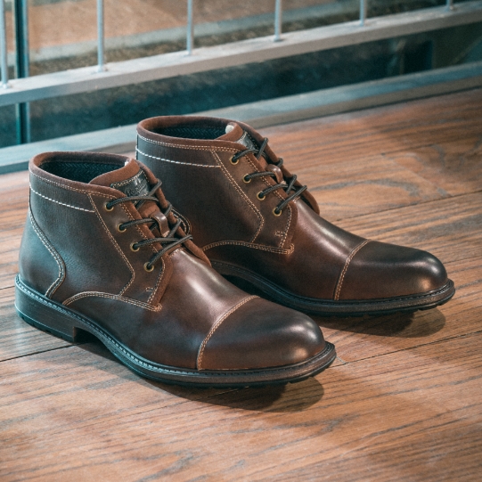 "Learn How To Clean Boots For Winter And More." The featured product is the Vandall Cap Toe Lace Up Boot in Cognac.