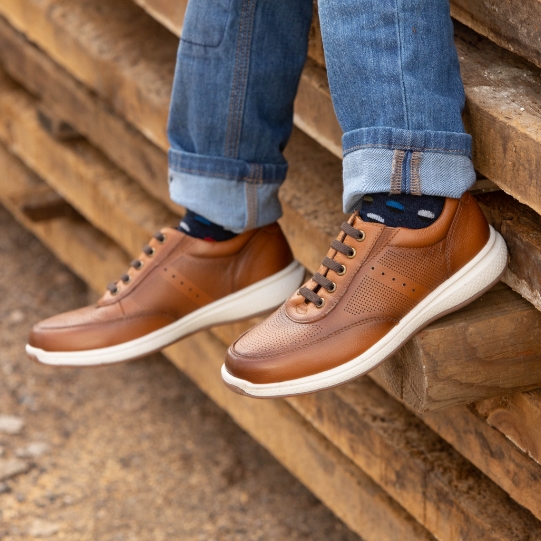 "Tips And Style Advice For Buying Kids Shoes." The featured product is the Great Lakes Jr. Sport Oxford in Cognac.