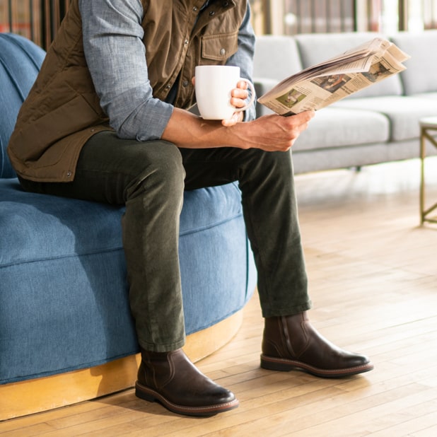 "Shoe Style Quiz: Find The Right Shoe For You." The featured image is a model sitting in a chair wearing the Norwalk Plain Toe Side Zip Boot in Brown Crazy Horse.