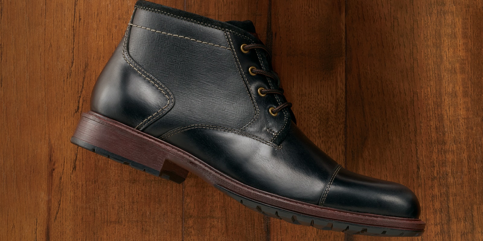 The featured product is the Lodge Plain Toe Gore Boot in Black Crazy Horse.