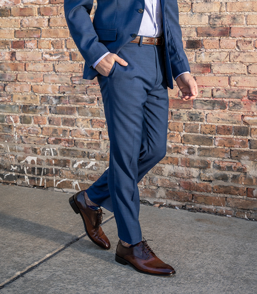 The featured image is a model walking in Florsheim dress shoes.