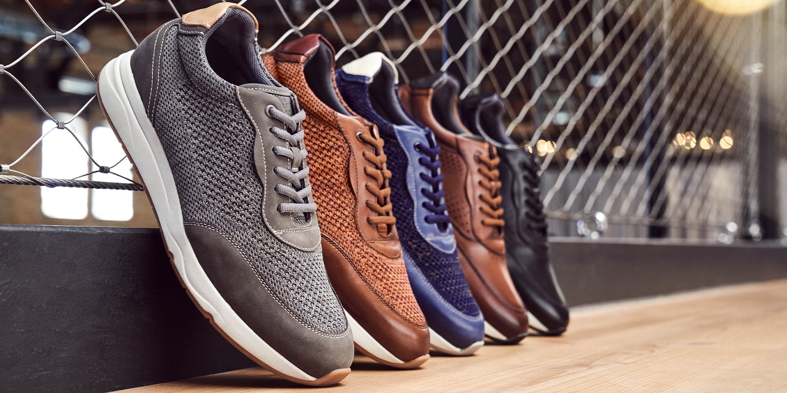 The featured products are the Formula Knit Moc Toe Lace Up Sneakers in Gray, Cognac Multi, and Navy.